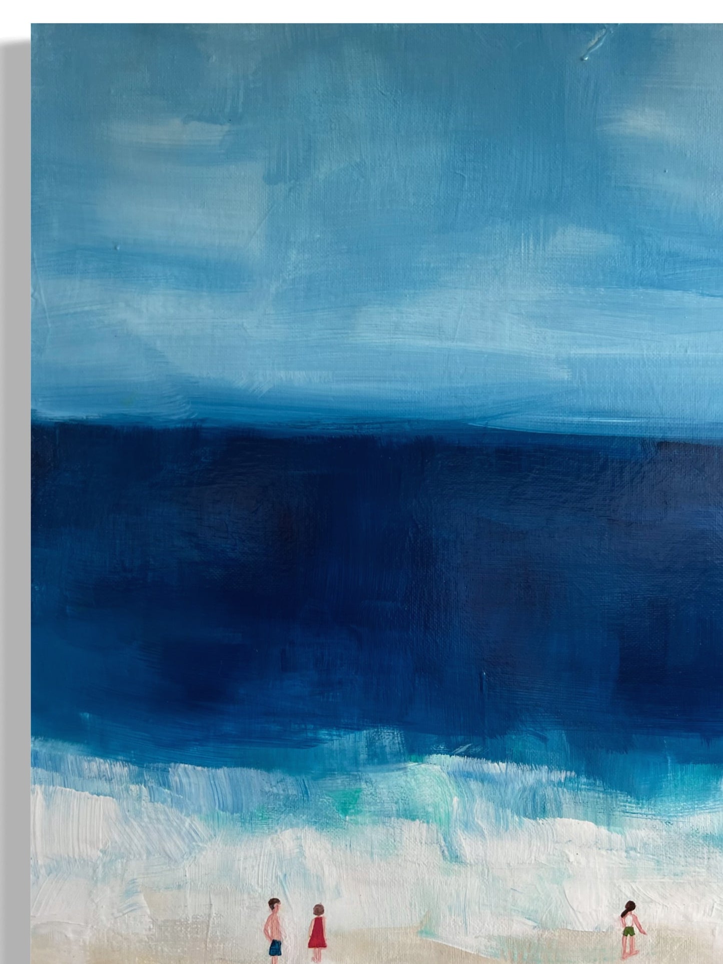 Original hand painted acrylic painting on canvas of swimmers in the deep blue ocean. The scene captures the fluid movement of the swimmers, with golden sand adding warmth to the composition. The deep blues of the water contrast with the soft, warm tones of the shore close-up.