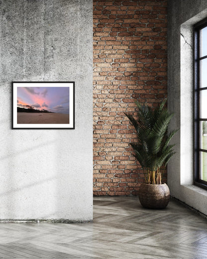 High quality print of a photograph capturing Tallow beach in Byron Bay, New South Wales. The vibrant scene evokes the beauty of the costal life and showcases the picturesque skyline against the mountain tops. Printed on premium material for a sophisticated finish.